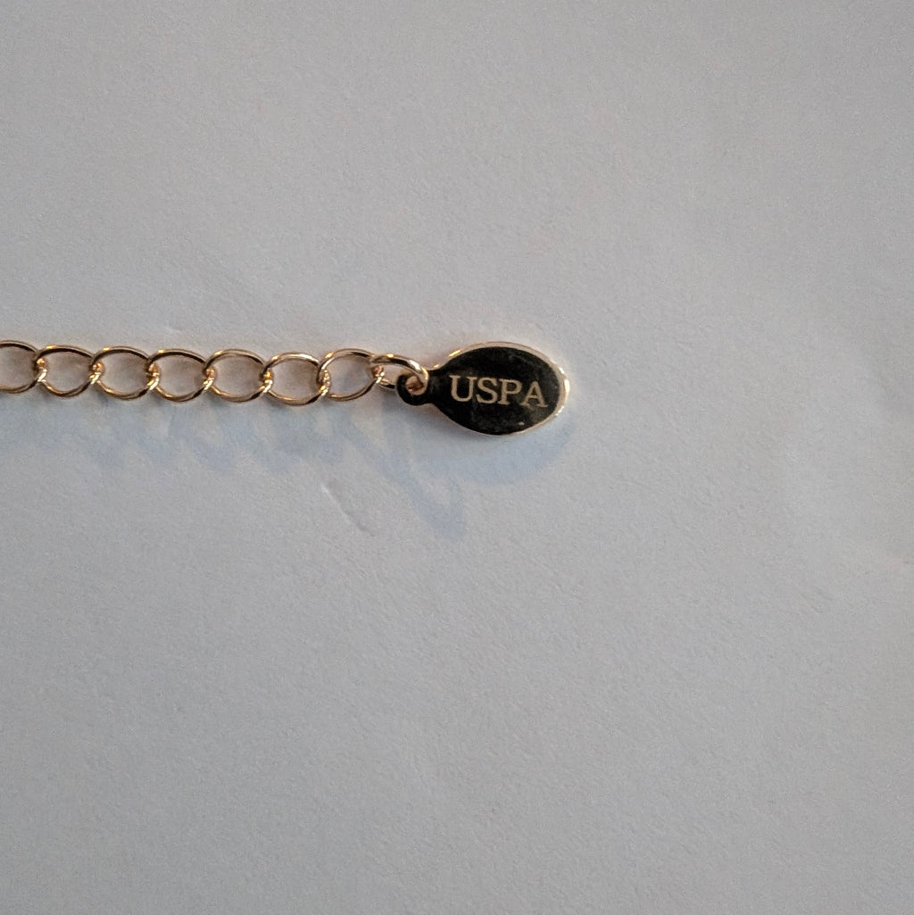 Bracelet doré de la marque us polo assn